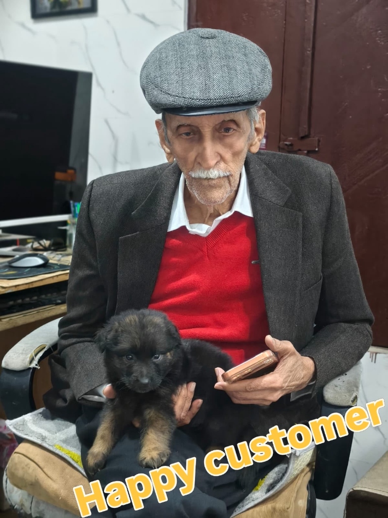Happy customer with German Shepherd puppy